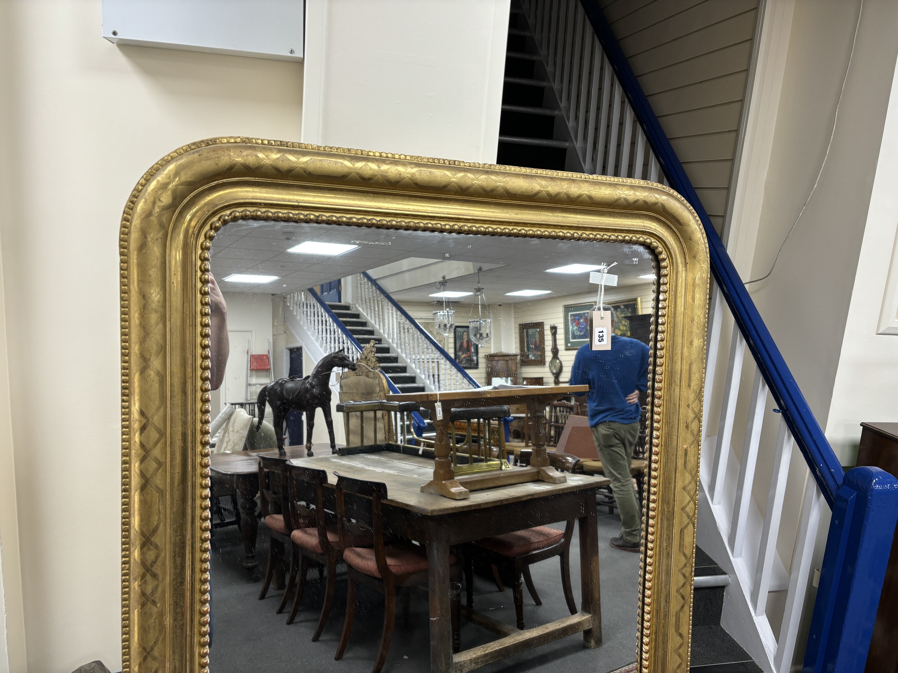 A 19th century French giltwood and composition overmantel mirror, width 101cm, height 167cm
